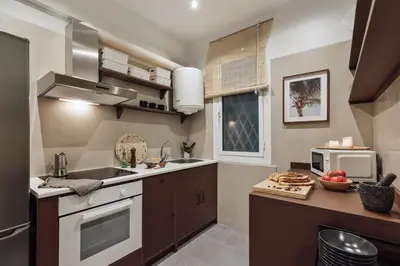 a home office with a desk and two chairs at Meko - 2 bedrooms and balcony in Eixample Esquerra in Barcelona