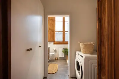 a living room with a couch and a table at Mahoro - 3 bedrooms in Ciutat Vella in Barcelona