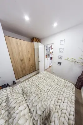 a bedroom with a large bed in a room at Terrace & BEACH apartment in Calella