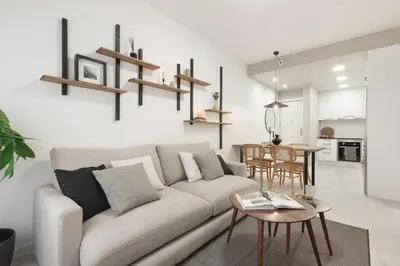 a bedroom with a bed with a tray of books at Lourdes - 3 bedrooms apartment in Sant Gervasi in Barcelona