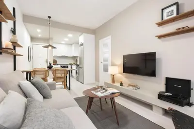 a bedroom with a bed with a candle on a night stand at Lourdes - 3 bedrooms apartment in Sant Gervasi in Barcelona