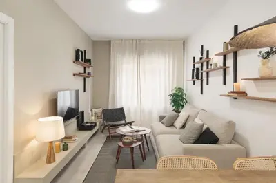 a living room with a couch and a table at Lourdes - 3 bedrooms apartment in Sant Gervasi in Barcelona
