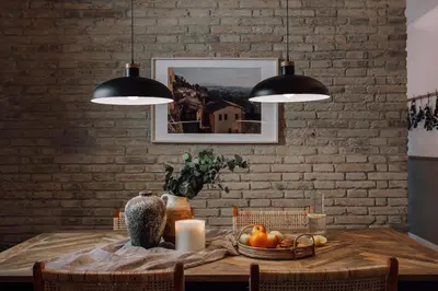 a dining room table with a bowl of fruit on it at Ejido - 1 bedroom and terrace in Gràcia in Barcelona