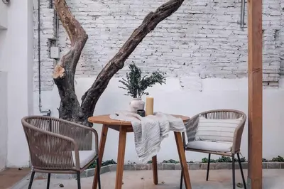 a living room with a flat screen tv on a wall at Ejido - 1 bedroom and terrace in Gràcia in Barcelona