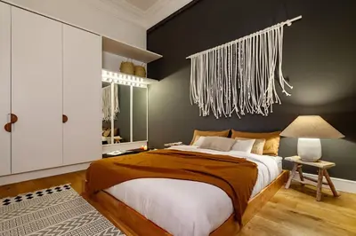 a living room with a couch and a tv at Atins - 2 bedrooms in Eixample Dreta in Barcelona