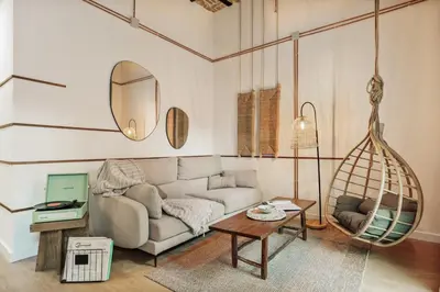 a bedroom with a bed with a basket of fruit on it at Malang - 2 bedrooms with terrace in Gràcia in Barcelona