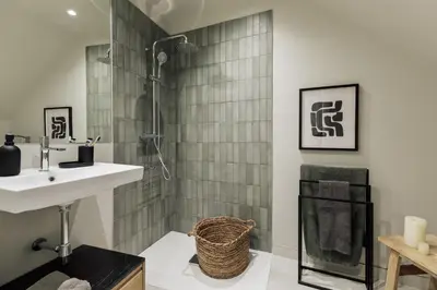 a bedroom with a bed with hats on the wall at Kevran - 2 bedrooms and terrace in Sant Pere in Barcelona