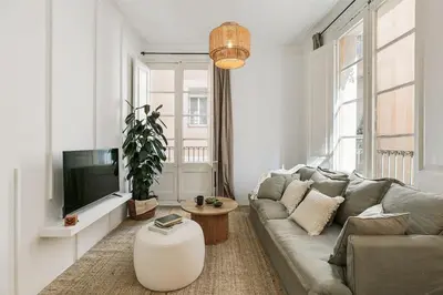 a bedroom with a bed with a basket of apples on it at Pano - 2 bedrooms in St Pere Sta Caterina i Ribera in Barcelona