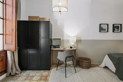 a dining room with a table and chairs at Pano - 2 bedrooms in St Pere Sta Caterina i Ribera in Barcelona