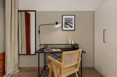 a living room with a couch and a table at Amatitlan - 3 bedrooms and balcony in Eixample in Barcelona