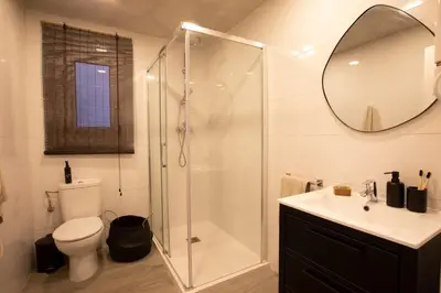 a hallway with white shelves in a white room at Yoko - 3 bedrooms and terrace in Eixample Dreta in Barcelona