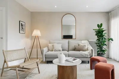 a dining room with a table and a potted plant at Arienzo - 2 bedrooms and balcony in Sant Gervasi in Barcelona