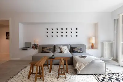 a hallway with a vase on a table in a room at Talat - 3 bedrooms in Eixample Esquerra in Barcelona