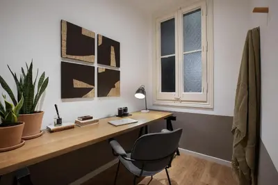 a white bathroom with a sink and a toilet at Amourah - 2 bedrooms in Eixample Esquerra in Barcelona