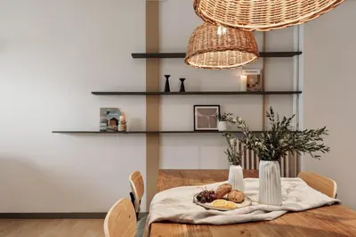 a living room with a couch and a table at Basil - 3 bedrooms and terrace in Sant Gervasi in Barcelona