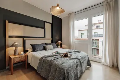 a bathroom with a toilet and a sink and a shower at Basil - 3 bedrooms and terrace in Sant Gervasi in Barcelona