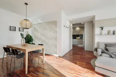 a bedroom with a bed with blue pillows at Fluvia - 2 bedrooms and terrace in Sant Gervasi in Barcelona