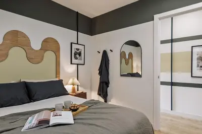 a living room with a couch and a table at Mescit - 2 bedrooms and balcony in Eixample Dreta in Barcelona
