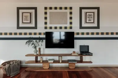 a living room with a couch and a view of a city at Misir - 2 bedrooms and terrace in Eixample Dreta in Barcelona