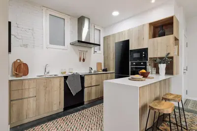 a living room with a couch and a table at Salar - 2 bedrooms in Gràcia in Barcelona