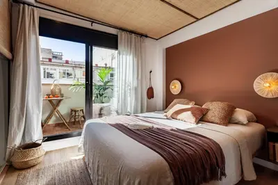 a kitchen with a table and chairs and a dining room at Batam - 1 bedroom and terrace in Gràcia in Barcelona