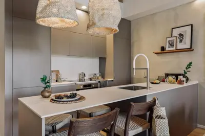 a living room with a couch and a tv at Minchin - 1 bedroom, balcony and pool in Poblenou in Barcelona
