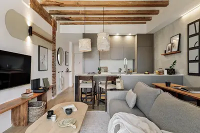 a hallway with a mirror on the wall and a desk at Minchin - 1 bedroom, balcony and pool in Poblenou in Barcelona