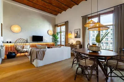 a bathroom with a bowl sink and a toilet at Sumbawa - 2 bedrooms in Eixample Dreta in Barcelona
