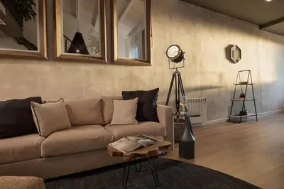 a patio with two chairs and a coffee table at Kalahari - 2 bedrooms and terrace in Gràcia in Barcelona