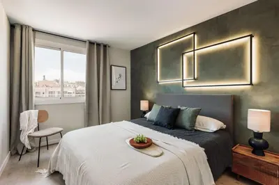 a bedroom with a large bed and a window at Coipasa - 3 bedrooms and terrace in Eixample Dreta in Barcelona