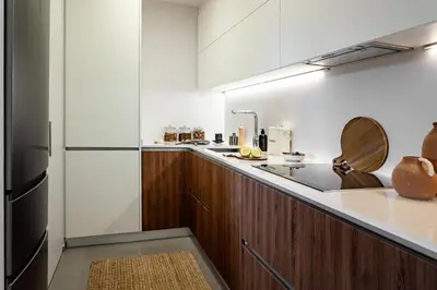 a bedroom with a large bed with two pillows at Idir - 2 bedrooms, a pool and terrace in Poblenou in Barcelona