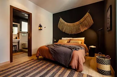 a bedroom with a bed and a large window at Hegra - 2 bedrooms, balcony in Eixample Esquerra in Barcelona