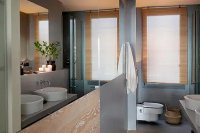 a living room with a table with a vase on it at Bara - 2 bedrooms in Eixample Dreta in Barcelona