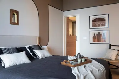 a kitchen with a sink and a stove at Bara - 2 bedrooms in Eixample Dreta in Barcelona