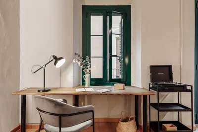 a living room with a couch and a table at Thar - 1 bedroom in Ciutat Vella in Barcelona