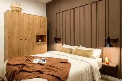 a bedroom with a bed and three pictures on the wall at Ebro - 3 bedrooms in Gràcia in Barcelona