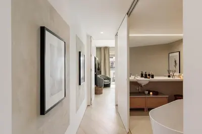 a living room with a couch and a tv at Mille - 2 bedrooms and terrace in Poblenou in Barcelona