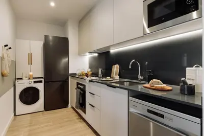 a bathroom with a toilet and a sink and a shower at Canadell - 2 bedrooms in Sant Antoni in Barcelona