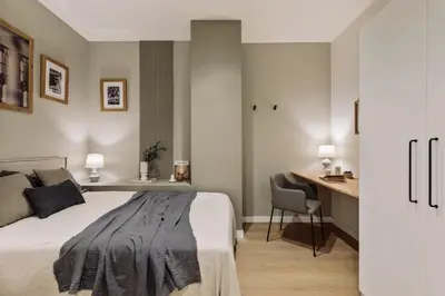 a living room with a couch and a table at Ixchel - 3 bedrooms, terrace and balcony in Gràcia in Barcelona