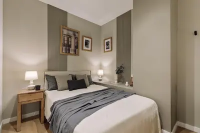 a kitchen and dining room with a table and chairs at Ixchel - 3 bedrooms, terrace and balcony in Gràcia in Barcelona