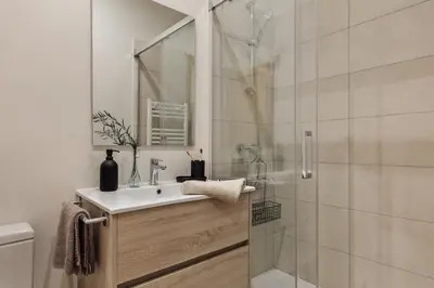 a bathroom with a toilet and a sink at Walla - 3 bedrooms and balcony in Eixample Dreta in Barcelona