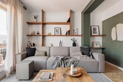 a bedroom with a bed and two lamps and a window at Itza - 3 bedrooms and office and terrace in Gràcia in Barcelona