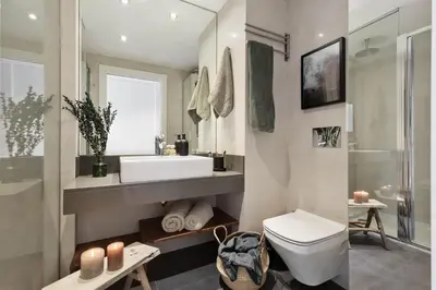 a kitchen with a bowl of fruit on a counter at Lys - 2 bedrooms and pool in Eixample Esquerra in Barcelona