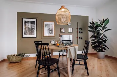 a dining room with a table and chairs at Castellar - 2 bedrooms in Eixample Dreta in Barcelona