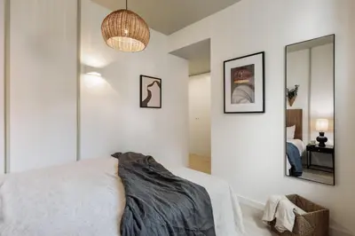 a home office with a desk and a mirror at Hebron - 2 bedrooms and office in Gràcia in Barcelona