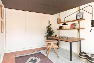 a living room with a couch and a table at Torla - 3 bedrooms and terrace in Sant Gervasi in Barcelona