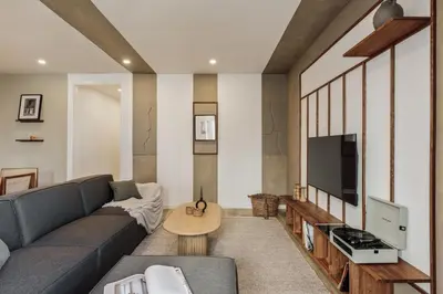 a white kitchen with white cabinets and a sink at Takalik - 4 bedrooms and office in l'Eixample Esq. in Barcelona