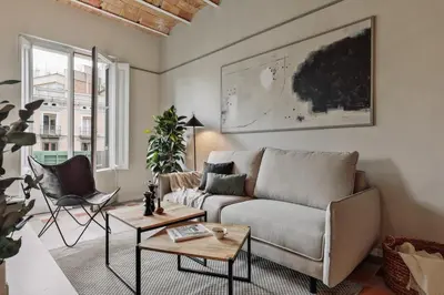 a kitchen with a washing machine in a room at Pollock - 2 bedrooms and office in Eixample Dreta in Barcelona
