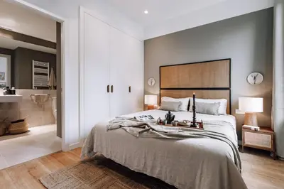 a kitchen and living room with a table and chairs at Montoro - 1 bedroom in Eixample Esquerra in Barcelona