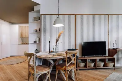 a living room with a couch and a table at Montoro - 1 bedroom in Eixample Esquerra in Barcelona